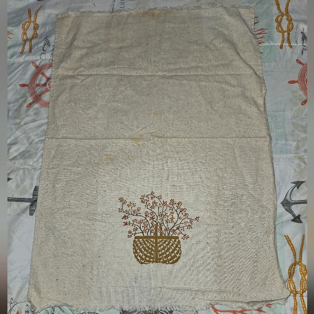 Vintage rough linen basket end table